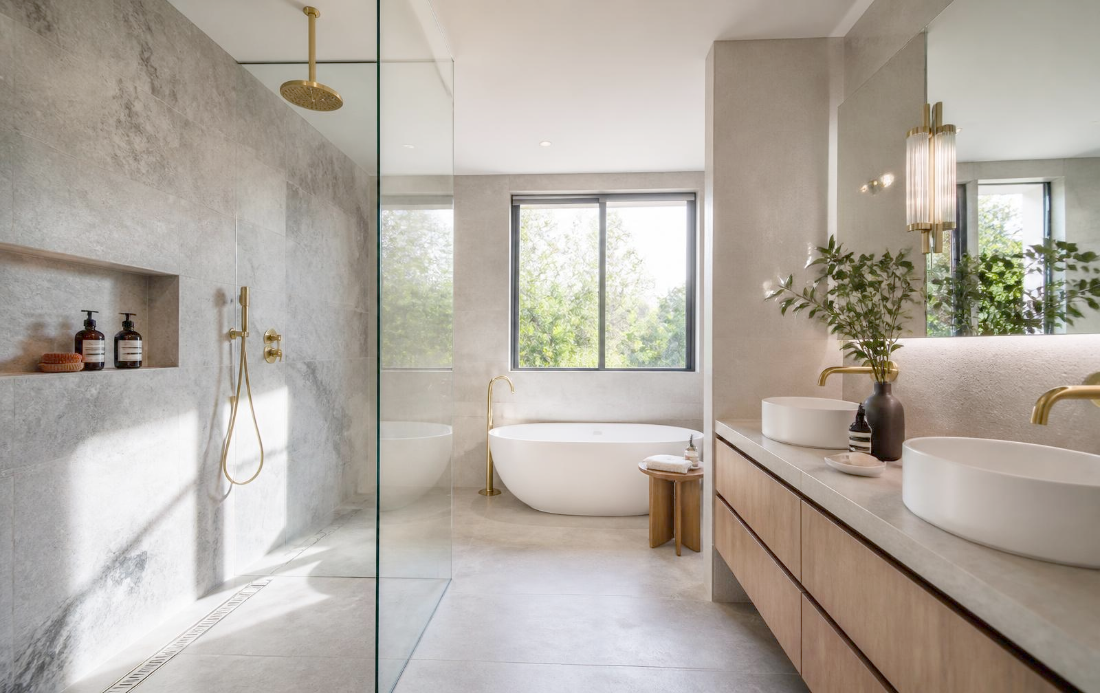 High specification modern bathroom with walk-in shower and freestanding bath